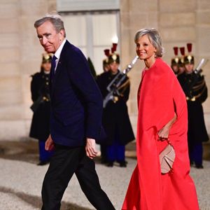 Bernard Arnault et sa femme Hélène Mercier au dîner d’état donné en l’honneur du président de l’Ouzbékistan au palais présidentiel de l’Elysée, à Paris, France, le 12 mars 2025. © Christian Liewig/Bestimage