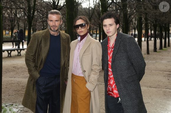 David Beckham, Victoria Beckham et Brooklyn Beckham assistent au défilé Louis Vuitton Men Menswear Fall/Winter 2018-2019 dans le cadre de la semaine de la mode à Paris, en France, le 18 janvier 2018. Photo par Jerome Domine/ABACAPRESS.COM