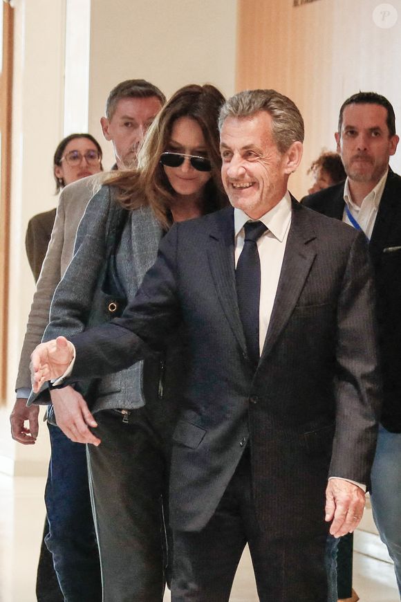 Nicolas Sarkozy et sa femme Carla Bruni - Dernier jour du procès du financement libyen de Sarkozy: ses avocats de l’ancien président vont plaider la relaxe, au tribunal de Paris, France, le 8 avril 2025. © Christophe Clovis/Bestimage