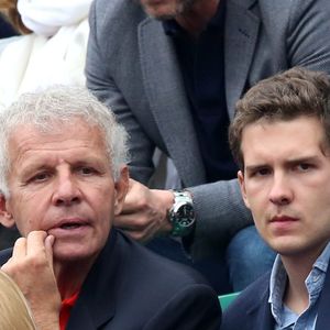 Patrick Poivre d'Arvor (PPDA) et son fils François dans les tribunes de la finale homme des internationaux de France de Roland Garros à Paris le 5 juin 2016. © Moreau-Jacovides / Bestimage