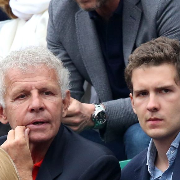 Patrick Poivre d'Arvor (PPDA) et son fils François dans les tribunes de la finale homme des internationaux de France de Roland Garros à Paris le 5 juin 2016. © Moreau-Jacovides / Bestimage