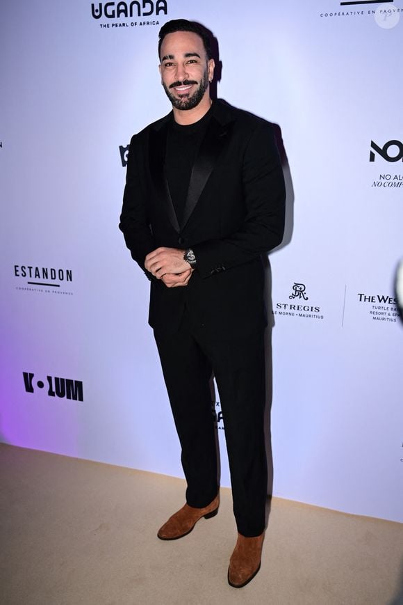Adil Rami - Photocall de la soirée AKILI MIRARI sur la plage "Croisette Beach - MGallery" lors du 79ème Festival International du Film de Cannes, le 13 mai 2026.
© Romain Doucelin/Bestimage
