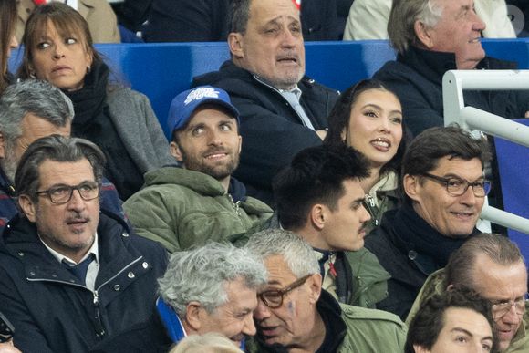 Squeezie et Chloé Gervais au match de rugby du Tournoi des Six Nations France contre Angleterre au Stade de France à Saint-Denis le 14 mars 2026. © AGENCE / BESTIMAGE