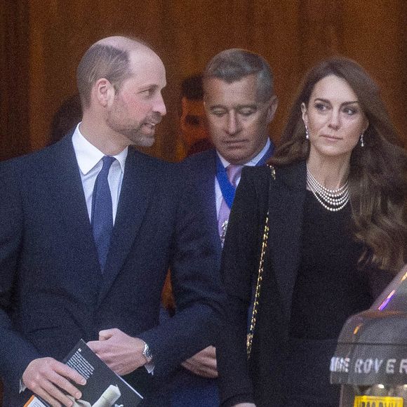 Le prince William, prince de Galles, et Catherine (Kate) Middleton, princesse de Galles, à la sortie de la cérémonie de commémoration des 80 ans de la libération du camp de concentration d'Auschwitz-Birkenau au Guildhall à Londres, le 26 janvier 2025. (AGENCE / BESTIMAGE).