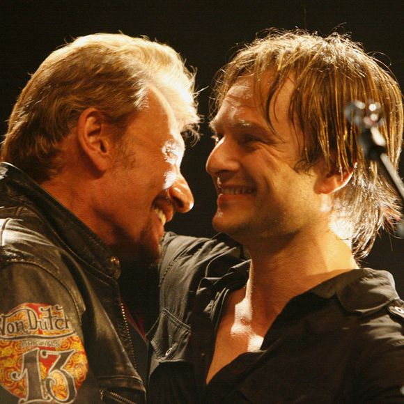 La relation entre David et son père Johnny n'a pas toujours été facile.

David Hallyday et son père Johnny Hallyday sur la scène de la Cigale à Paris. Photo by Marco Vitchi/ABACAPRESS.COM