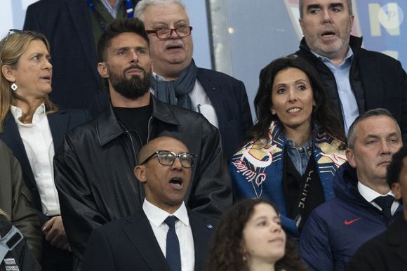 Olivier Giroud et sa femme Jennifer Giroud, Philippe Diallo - Célébrités dans les tribunes du quart de finale de la Ligue des Nations de l'UEFA 2025 "France - Croatie (2-0 / tab 5-4)" au Stade de France à Saint-Denis le 23 mars 2025. © Cyril Moreau/Bestimage