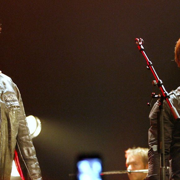 David Hallyday et son père Johnny Hallyday sur la scène de la Cigale à Paris le 17 mars 2008.  Photo by Marco Vitchi/ABACAPRESS.COM