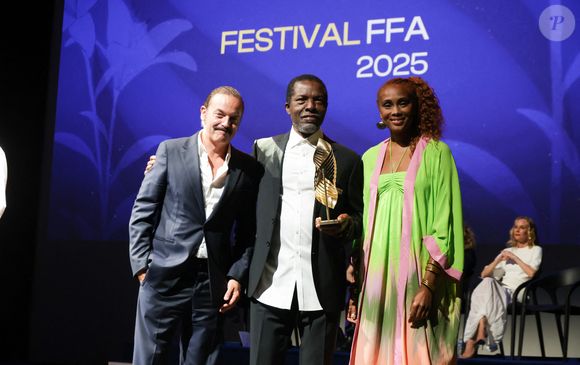 Patrick Mille, Imany et Isaach de Bankole - Valois de l’acteur : Isaach de Bankolé dans « Muganga, celui qui soigne » - Cérémonie de remise des prix lors de la 18ème édition du Festival du Film Francophone d'Angoulême (FFA) le 30 août 2025 à Angoulême.
© Guirec Coadic / Bestimage