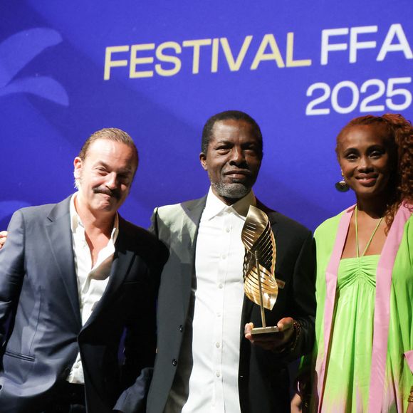 Patrick Mille, Imany et Isaach de Bankole - Valois de l’acteur : Isaach de Bankolé dans « Muganga, celui qui soigne » - Cérémonie de remise des prix lors de la 18ème édition du Festival du Film Francophone d'Angoulême (FFA) le 30 août 2025 à Angoulême.
© Guirec Coadic / Bestimage