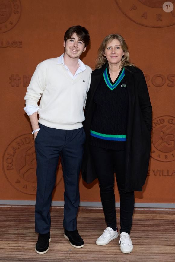 Amanda Sthers et son fils Oscar Bruel au village (night session) lors des Internationaux de France de tennis de Roland Garros 2024, à Paris, France, le 31 mai 2024. © Jacovides-Moreau/Bestimage