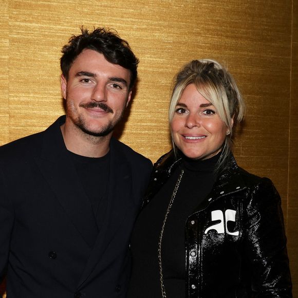 Exclusif - Sophie Tapie (enceinte) et son mari Baptiste Germain lors du cocktail après-spectacle lors de la soirée Ciné-concert symphonique "Alain Delon, le dernier Samouraï" au Palais des congrès à Paris le jour de son anniversaire le 8 novembre 2024.

© Jacovides / Moreau / Bestimage