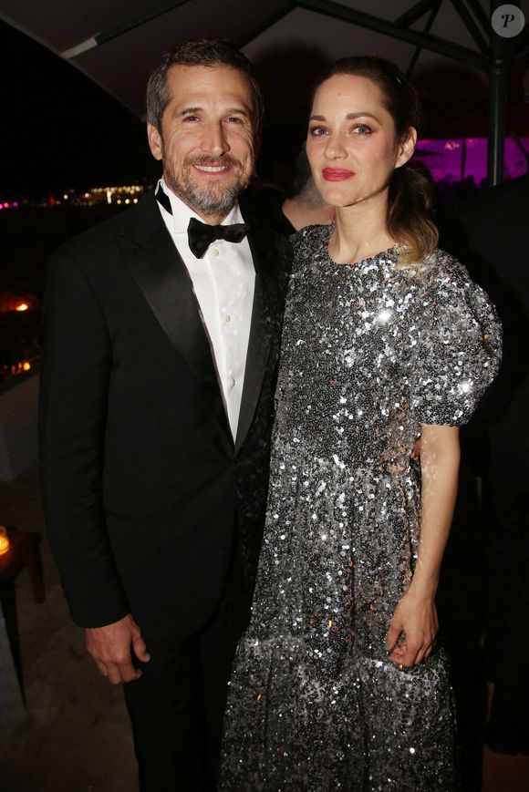 Guillaume Canet et Marion Cotillard assistent à l'After Party La Belle Epoque qui se tient à La Mome dans le cadre du 72e Festival de Cannes, le 20 mai 2019 à Cannes, France. Photo Jerome Domine/Abaca