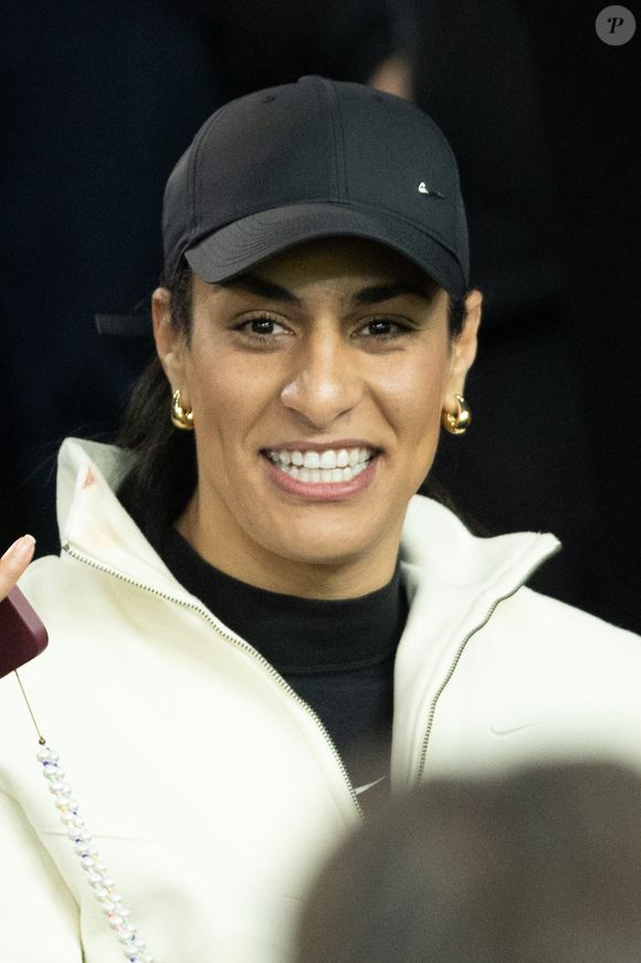 Imane Khelif - Célébrités dans les tribunes lors du match de Ligue des Champions entre le Paris Saint Germain contre Tottenham Hotspur Football Club (5-3) au Parc des Princes à Paris le 26 novembre 2025. © Cyril Moreau/Bestimage