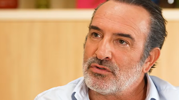 Jean Dujardin en interview pour TF1 et Audrey Crespo-Mara.