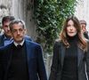 Nicolas Sarkozy, accompagné de sa femme Carla Bruni, sort de son domicile pour être incarcéré à la prison de La Santé à Paris, France, le 21 octobre 2025.

© Bestimage