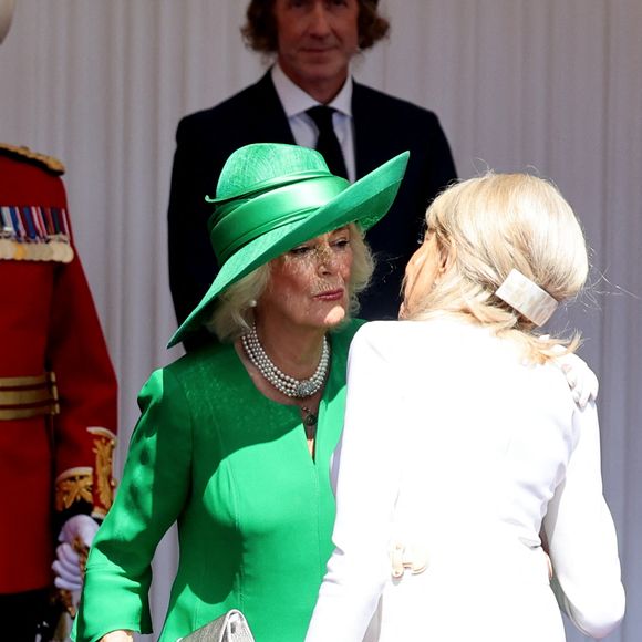 Le roi Charles III d'Angleterre, Camilla Parker Bowles, reine consort d'Angleterre, le prince William, prince de Galles, et Catherine (Kate) Middleton, princesse de Galles, accueillent le couple présidentiel français le président Emmanuel Macron et sa femme la Première Dame Brigitte Macron sur Datchet road à Windsor, Royaume Uni, le 8 juillet 2025. © Dominique Jacovides/Bestimage