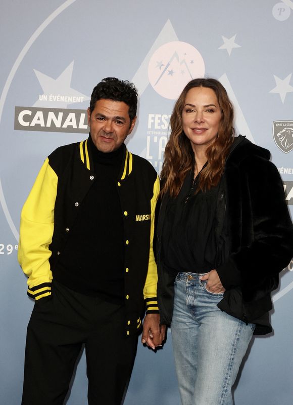 Jamel Debbouze et sa femme Mélissa Theuriau - Tapis rouge lors du 29ème Festival International du Film de Comédie de l'Alpe d'Huez le 21 Janvier 2026. © Dominique Jacovides/Bestimage