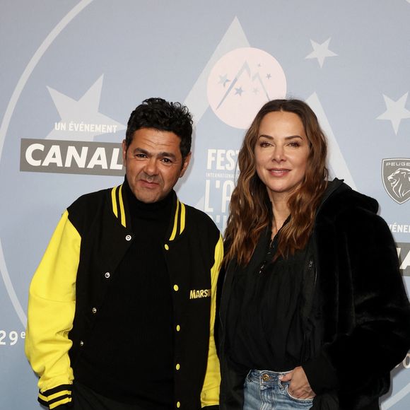 Jamel Debbouze et sa femme Mélissa Theuriau - Tapis rouge lors du 29ème Festival International du Film de Comédie de l'Alpe d'Huez le 21 Janvier 2026. © Dominique Jacovides/Bestimage
