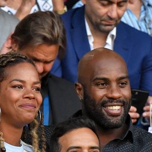 Teddy Riner et sa compagne Luthna Plocus - People dans les tribunes - Match de football en ligue 1 Uber Eats : Le PSG (Paris Saint-Germain) remporte la victoire 4-2 contre Strasbourg au Parc des Princes le 14 août 2021. Pas de jauge pour ce match, le Parc des Princes est rempli au maximum de sa capacité, une première depuis 18 mois.

© Lionel Urman / Panoramic / Bestimage
