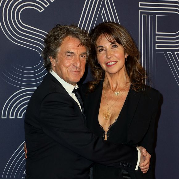 François Cluzet et sa femme Narjiss Slaoui-Falcoz au photocall de la 47ème édition de la cérémonie des César à l'Olympia à Paris, le 25 février 2022. © Borde-Jacovides / Bestimage