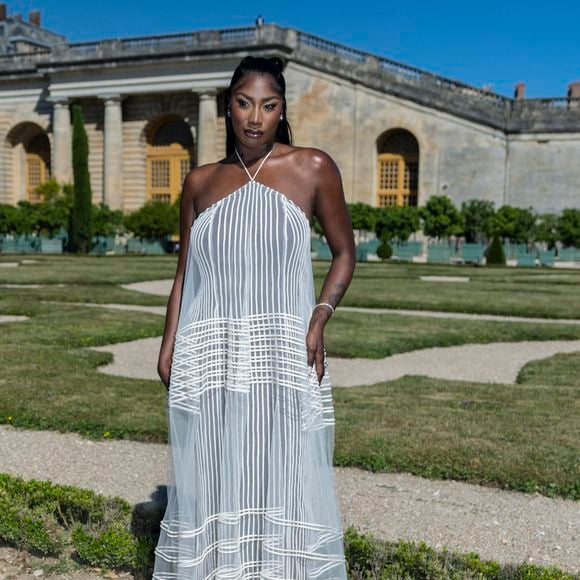 Aya Nakamura au photocall du défilé Jacquemus de la mode homme Printemps/Été 2026 dans le cadre de la Fashion Week de Paris dans les jardins de l’Orangerie à Versailles, France, 2025.

© Olivier Borde/Bestimage