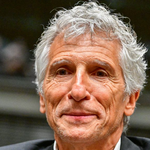 Le présentateur de télévision et producteur audiovisuel Nagui assiste à une audition de la Commission d'enquête parlementaire sur la neutralité, le fonctionnement et le financement du service public de radiodiffusion français à l'Assemblée nationale, à Paris, le 1er avril 2026. 

© Christian Liewig/Bestimage