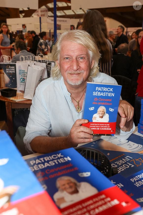 "Elle est danseuse avec moi, régisseuse sur mes clips... Elle est partout", déclare-t-il.

Patrick Sébastien à la Halle Georges Brassens de Brive-la-Gaillarde pour la Foire du Livre de Brive , le 9 novembre 2024. © Jean-Marc Lhomer / Bestimage