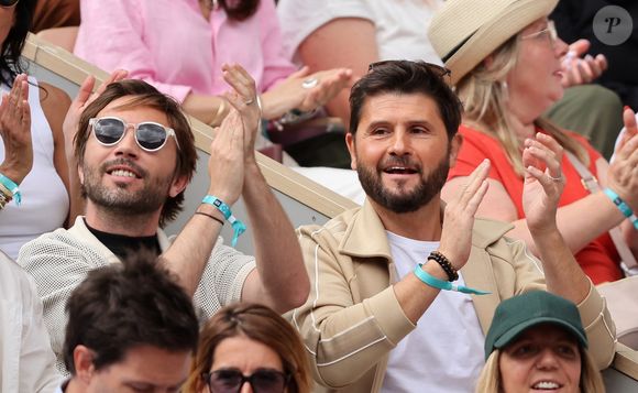 Christophe Beaugrand et son mari Ghislain Beaugrand-Gerin dans les tribunes lors des Internationaux de France de Tennis de Roland Garros 2025. Paris,

© Jacovides / Moreau / Bestimage