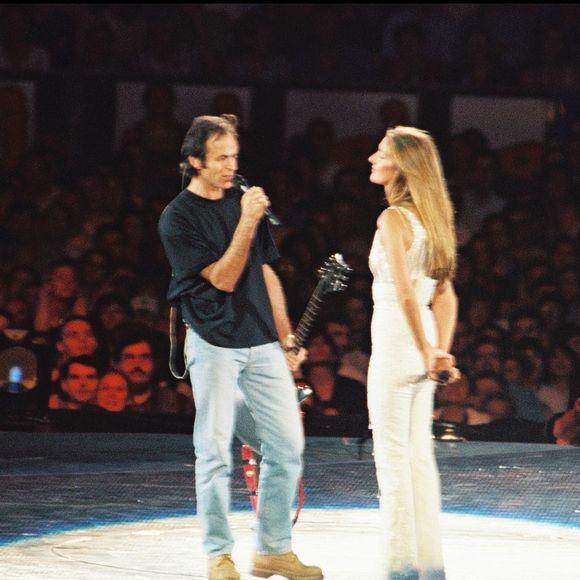 Archives - Céline Dion et Jean-Jacques Goldman lors du concert de Céline Dion au Stade de France à Paris.
Crédit : AGENCE / BESTIMAGE