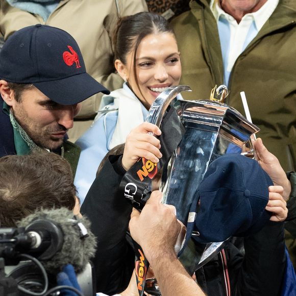 Exclusif - Clément, frère d'A.Dupont, Iris Mittenaere lors du match de rugby du Tournoi des Six Nations France contre Angleterre au Stade de France à Saint-Denis le 14 mars 2026. © AGENCE / BESTIMAGE