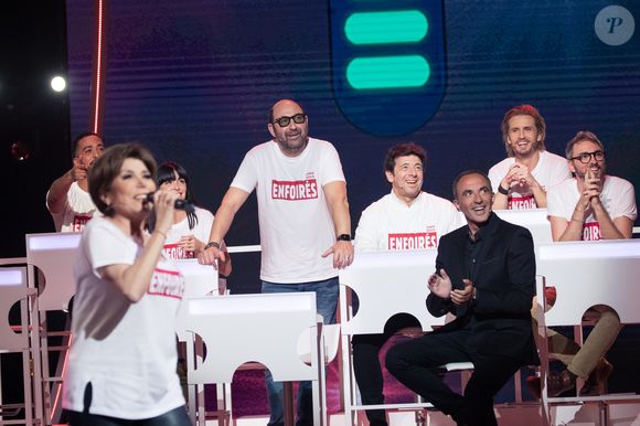 Mais il y a une chanteuse, pourtant très célèbre, qui n'était présente aux enregistrements du spectacle, du 14 au 20 janvier, à la Sud de France Arena, à Montpellier : Liane Foly.

Exclusif - Nikos Aliagas, Liane Foly, Slimane, Jenifer Bartoli, Kad Merad, Patrick Bruel, Philippe Lacheau et Christophe Willem - Enregistrement de l'émission "Les Enfoirés jouent le jeu", le 18 novembre 2019 © Cyril Moreau / Bestimage