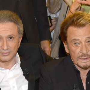 Michel Drucker et Johnny Hallyday - Enregistrement de l'émission "Vivement Dimanche" à Paris le 14 mars 2014. © COADIC GUIREC / BESTIMAGE