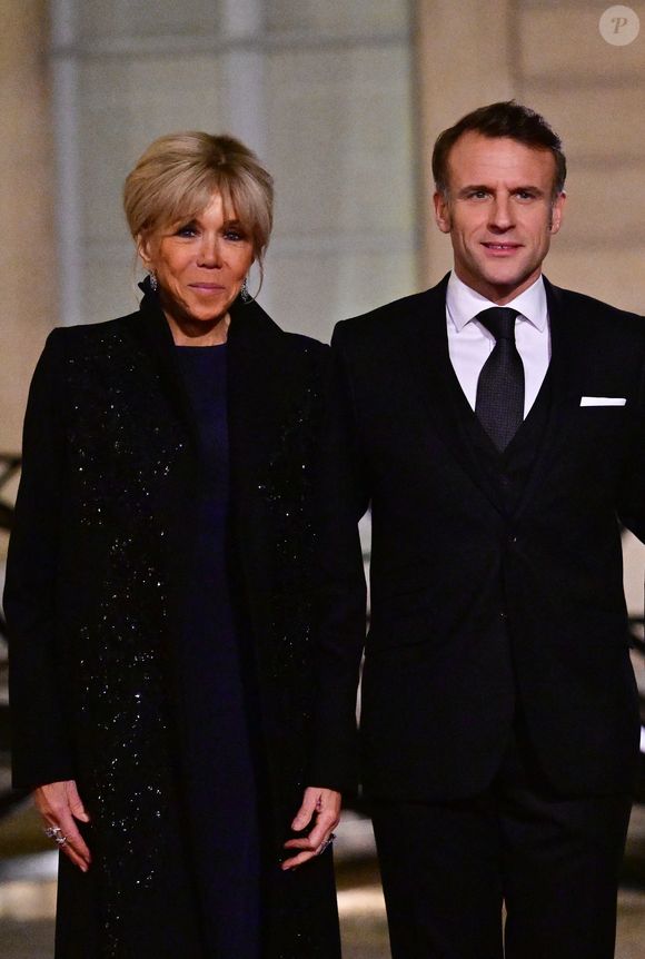 Le président Emmanuel Macron et sa femme Brigitte Macron arrivant au dîner d'état donné en l'honneur du couple présidentiel d'Angola au palais de l'Elysée à Paris le 17 janvier 2025.
© Christian Liewig / Bestimage