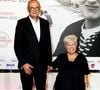 Ils ont ainsi baptisé leur domaine viticole "Minoist", qui est en fait la contraction de leurs deux prénoms

Benoist Gérard et sa femme Mimie Mathy - Cérémonie d'ouverture du Festival Lumière 2021 à Lyon le 9 octobre 2021.
© Dominique Jacovides / Bestimage