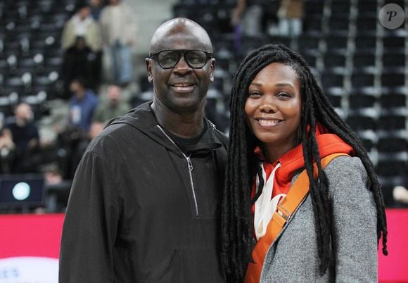 Lilian Thuram et sa femme Kareen Guiock-Thuram - Les célébrités assistent à la victoire du club Paris Basketball face au Baskonia Vitoria (67-65) à l'Adidas Arena à Paris, le 1er novembre 2024. 
© Jonathan Rebboah / Panoramic / Bestimage