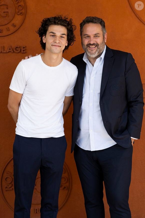 Bruce Toussaint et son fils Noé Toussaint au village lors des Internationaux de France de Tennis de Roland Garros 2025. Paris, le 30 mai 2025.
© Moreau / Jacovides / Bestimage