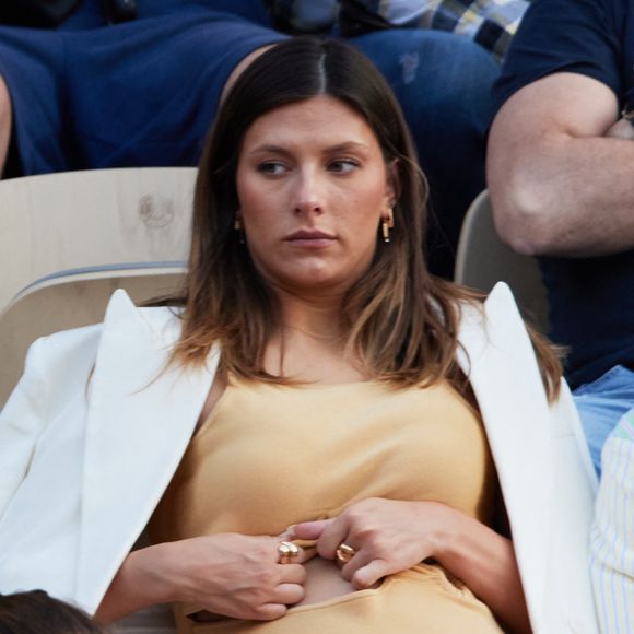 Camille Cerf (Miss France 2015), enceinte dans les tribunes lors des Internationaux de France de Tennis de Roland Garros 2023. Paris, le 7 juin 2023. © Jacovides-Moreau / Bestimage