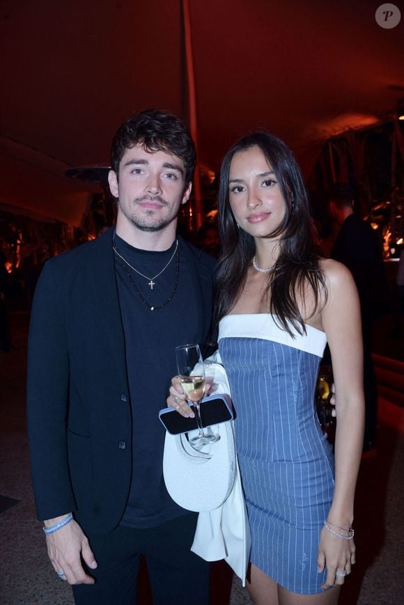 Charles Leclerc et sa compagne Alexandra Saint-Mleux - Soirée APM Monaco au restaurant "le Baoli " pour le lancement de la nouvelle collection été APM Monaco lors du 77ème Festival International du Film de Cannes le 22 mai 2024. K. Prette, directrice artistique lance une collection 100% Gold pour cet été avec comme nouvelle égérie de la maison, C. Delevigne. © Rachid Bellak/Bestimage