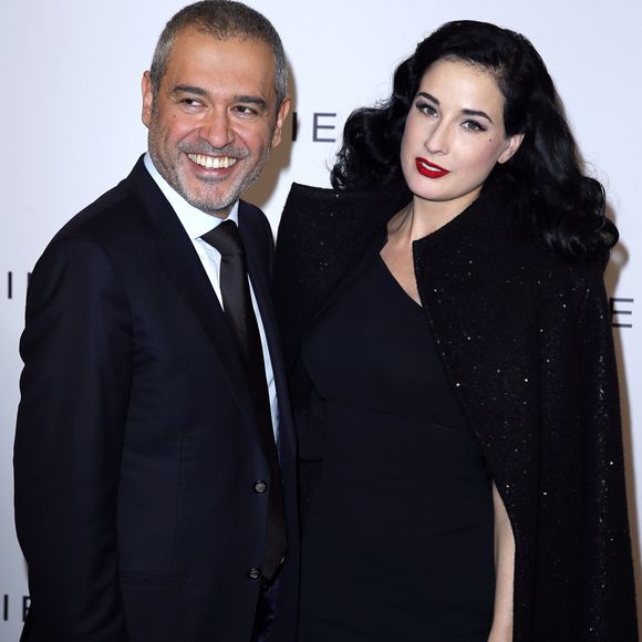 Le couturier Elie Saab et Dita Von Teese - People au défilé Haute-couture Printemps/Été 2013 Elie Saab à Paris le 23 janvier 2013. OLIVIER BORDE / BESTIMAGE