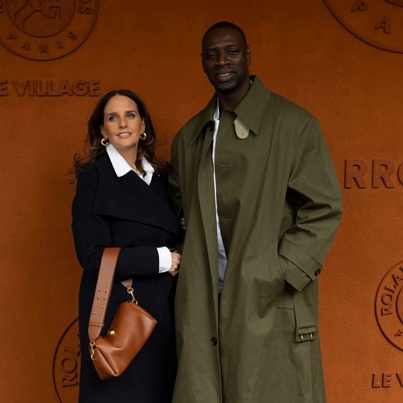 Omar Sy et sa femme Helene au village lors des Internationaux de France de Tennis de Roland Garros 2025, à Paris, France, le 7 juin 2025.

© Cyril Moreau/Bestimage