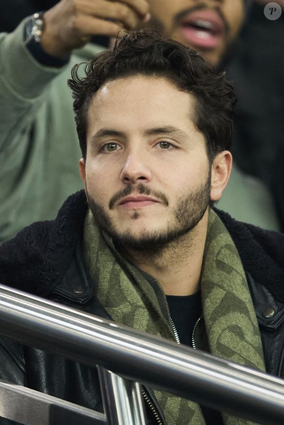 Alexandre Kominek dans les tribunes lors du match de Ligue Des Champions 2024-2025 (LDC) "PSG - Brest (7-0)" au Parc Des Princes, le 19 février 2025.
© Cyril Moreau/Bestimage