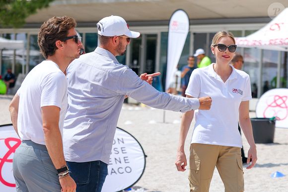 La princesse Charlène de Monaco et son frère Gareth Wittstock lors de la journée "Water Safety Day, pour la prévention de la noyade" sur la plage du Larvotto de Monaco, le 17 juin 2025. Cet événement est organisé par sa Fondation, le Centre de Sauvetage Aquatique de Monaco (CSAM) en partenariat avec la Croix-Rouge monégasque. © Claudia Albuquerque/Bestimage