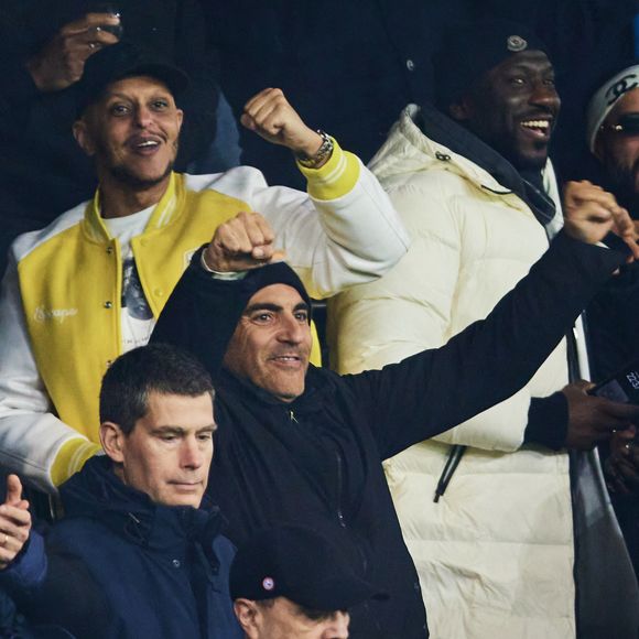Tareek et Ary Abittan - Célébrités assistent au match de Ligue des champions entre le PSG et Manchester City (4-2) au Parc des Princes à Paris le 22 janvier 2025. © Cyril Moreau/Bestimage