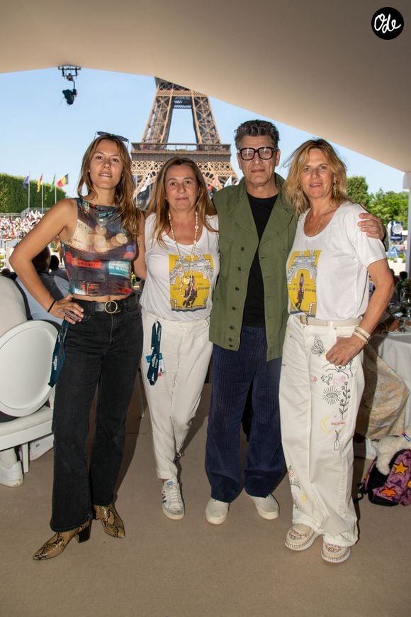 Exclusif - Yasmine Lavoine, Coco Coupérie Eiffel, Marc Lavoine, et Virginie Coupérie-Eiffel dans l'Espace VIP lors de la 9ème édition du "Longines Paris Eiffel Jumping" au Champ de Mars à Paris, France, le 24 juin 2024. © Perusseau-Veeren/Bestimage