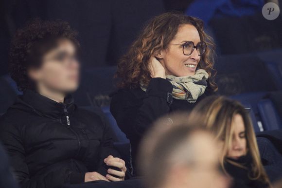 Marie-Sophie Lacarrau et son fils - Célébrités dans les tribunes du match de Ligue 1 McDonald's opposant le Paris Saint-Germain (PSG) à L’AS Monaco (4-1) au Parc des Princes à Paris le 7 février 2024. © Cyril Moreau/Bestimage