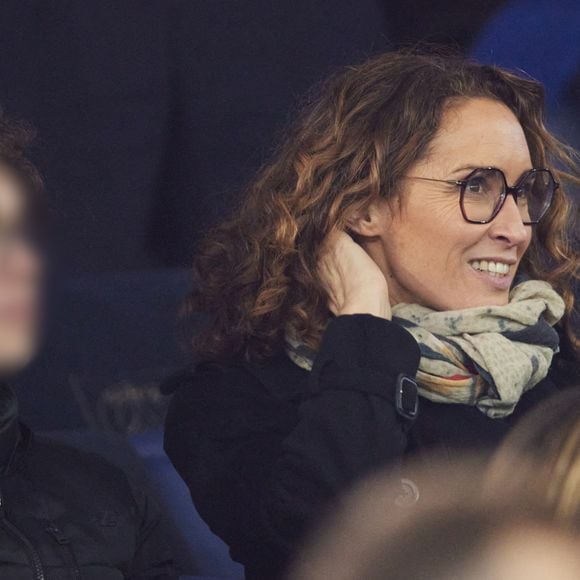 Marie-Sophie Lacarrau et son fils - Célébrités dans les tribunes du match de Ligue 1 McDonald's opposant le Paris Saint-Germain (PSG) à L’AS Monaco (4-1) au Parc des Princes à Paris le 7 février 2024. © Cyril Moreau/Bestimage