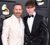 Tim-Elvis a même eu l'honneur de monter sur scène aux côtés de son père, ce qui a rendu sa mère particulièrement fière.

David Guetta et son fils Tim Elvis au photocall de la 64ème édition des Grammy Awards au MGM Grand Garden à Las Vegas le 3 avril 2022.

© Broadimage / Bestimage