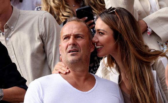 Roger Erhart et sa compagne Delphine Wespiser, Miss France 2012 - Célébrités dans les tribunes des internationaux de France de Roland Garros à Paris le 31 mai 2022. © Cyril Moreau - Dominique Jacovides/Bestimage
