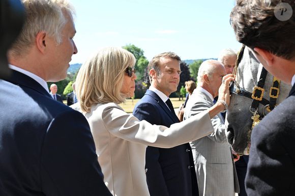 Déambulation d'Emmanuel Macron, président de la République Française, et de la Première dame Brigitte Macron, dans les jardins du château de Windsor avec le roi Charles III d'Angleterre et Camilla Parker Bowles, reine consort, le 9 juillet 2025.  © Jeanne Accorsini / Pool / Bestimage