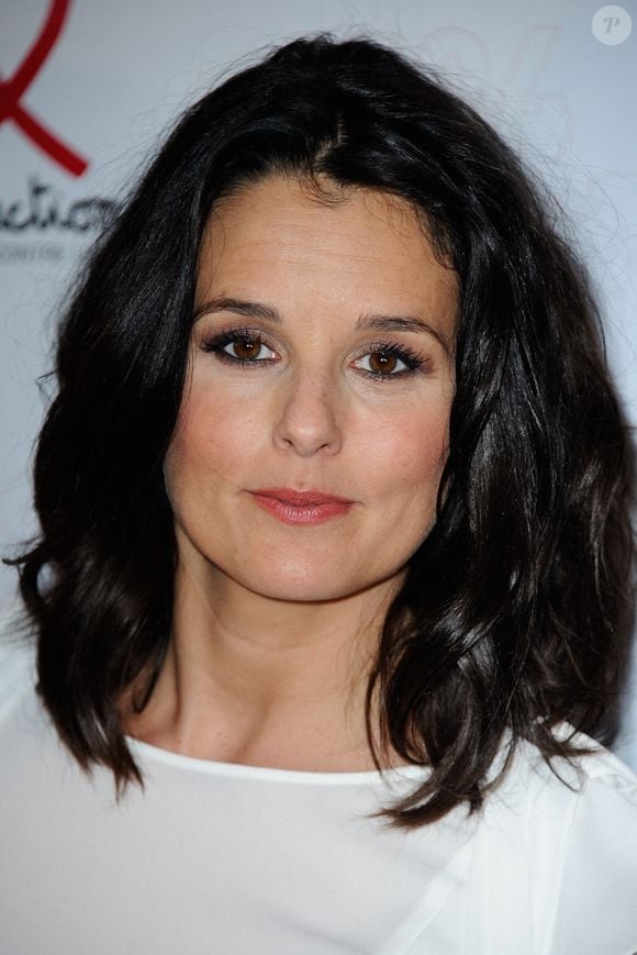 Faustine Bollaert pose lors d'un photocall pour le lancement du Sidaction 2014 et du 'Sidaction 20e anniversaire' qui s'est tenu au Musée du quai Branly à Paris, France, le 10 mars 2014. Photo par Aurore Marechal/ABACAPRESS.COM